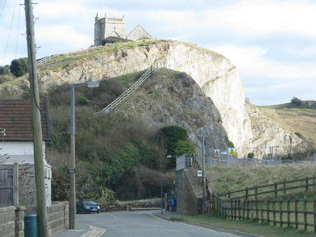 St Nicholas Church on its rock above Uphill beach road - geograph.org.uk - 1748886