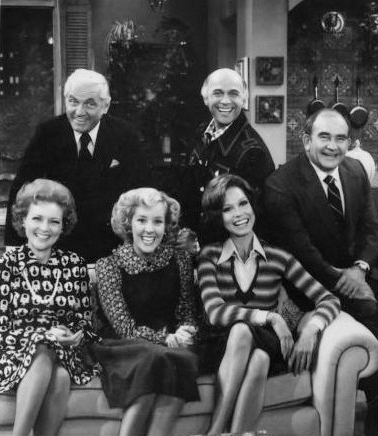 Cast in 1977. (top) Ted Knight, Gavin MacLeod, and Ed Asner; (bottom) Betty White, Georgia Engel, and Mary Tyler Moore