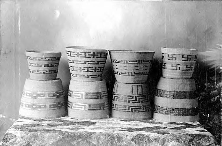 File:Eight large Tlingit baskets displayed on fur-covered table, Alaska, between 1905 and 1915 (AL+CA 4814).jpg