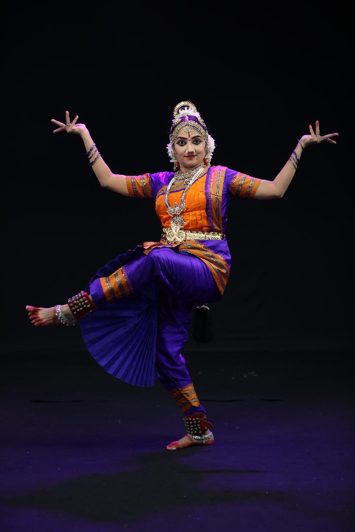 kuchipudi is one of the classical dancer forms of india,from the state  andhra pradesh.here the dancer poses before a temple with sculptures Stock  Photo - Alamy