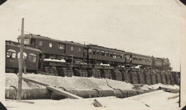 File:Interurban train with passengers crossing temporary trestle.jpg