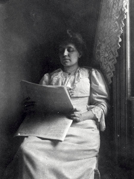 File:Betty Kurth reading newspaper next to window (5483637480).jpg