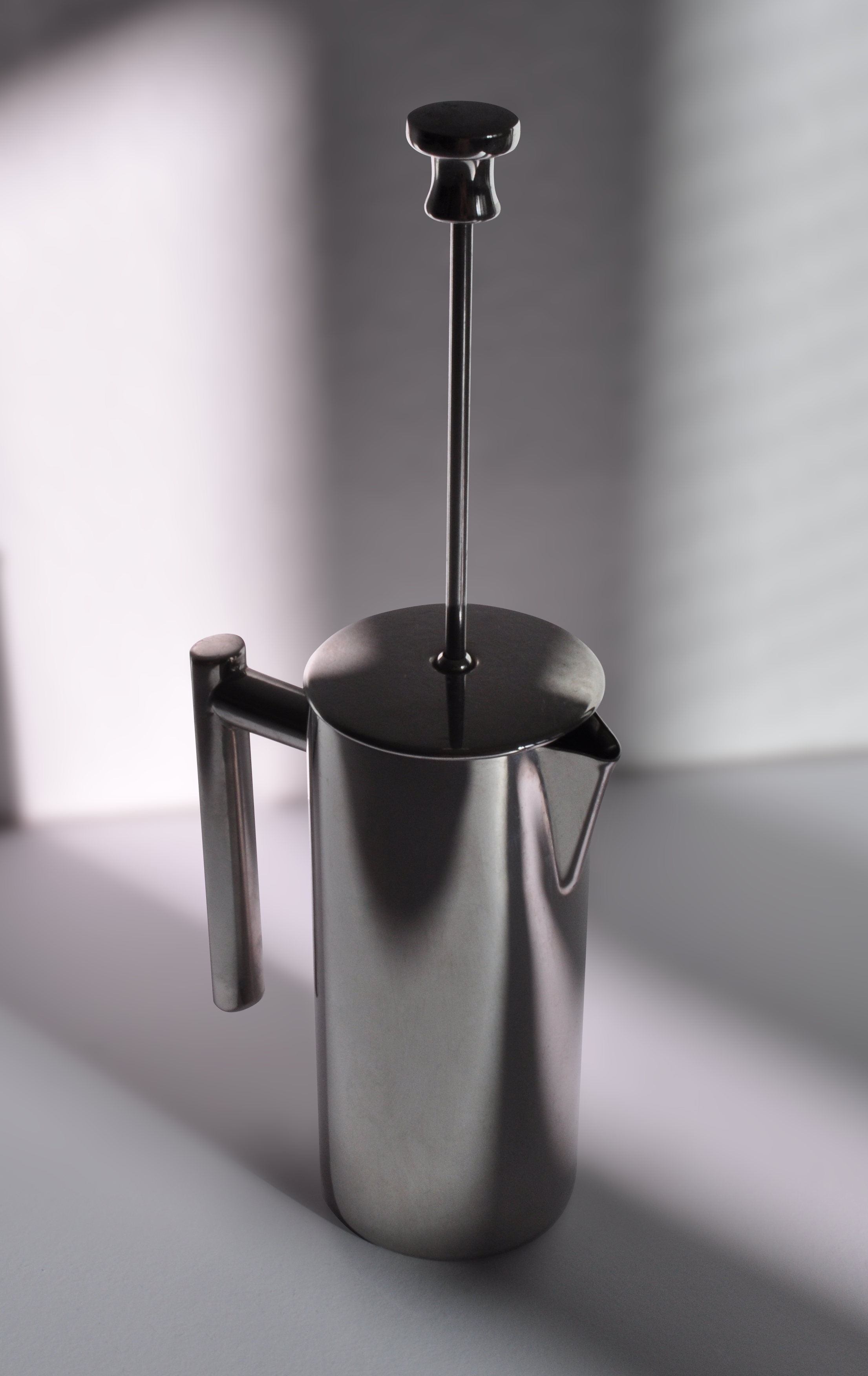 Stainless steel french press.png