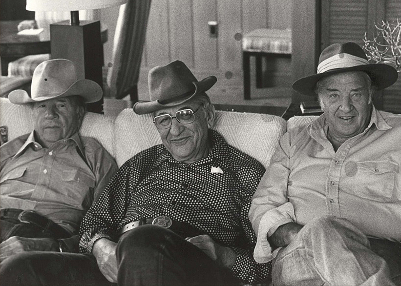 Fisher (center), [[John Bugas]] (left), [[Henry Ford II]] (right) at Bugas's [[Wyoming]] ranch