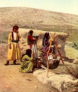 Traditional butter-making in Palestine. Ancient techniques were still practiced in the early 20th century. National Geographic, March 1914.