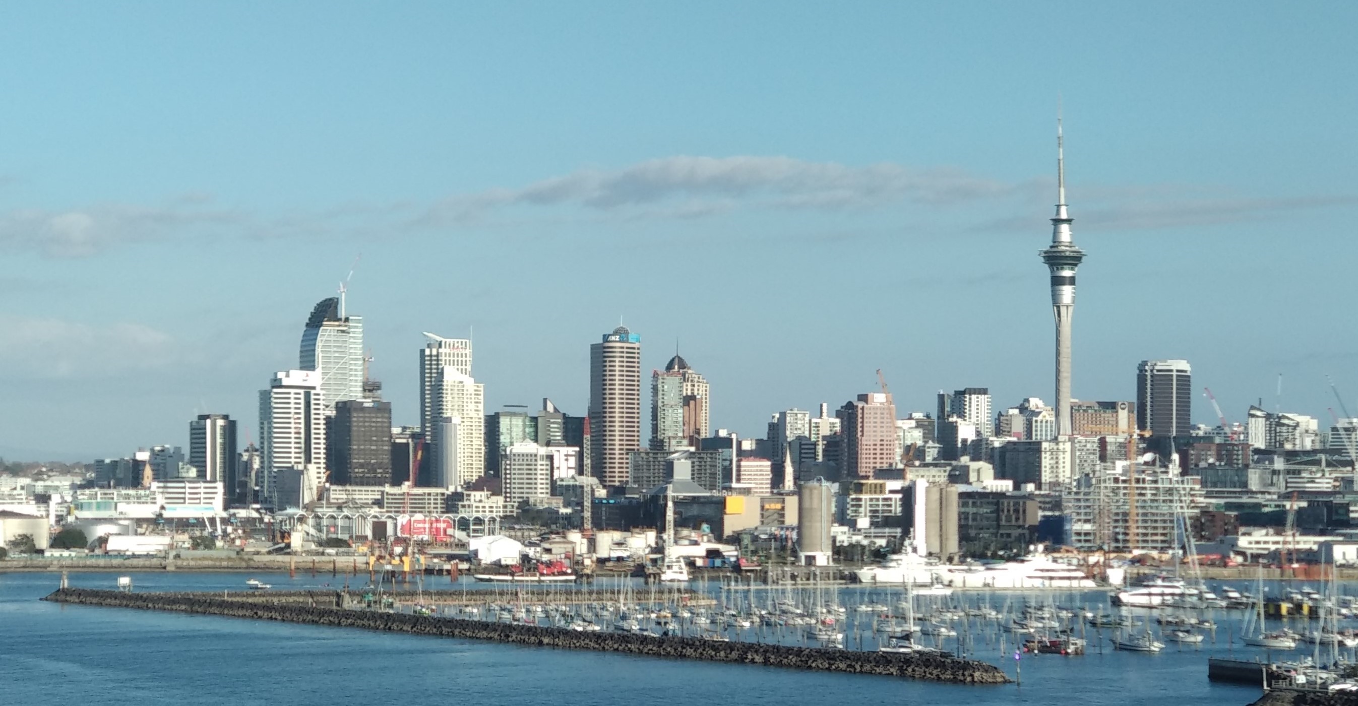 Auckland ( AWK-lənd; Māori: Tāmaki Makaurau) is a large metropolitan city in the North Island of New Zealand. It has an urban population of about 1,478,800 (June 2023). It is located in the greater Auckland Region, the area governed by Auckland Council, which includes outlying rural areas and the islands of the Hauraki Gulf, and which has a total population of 1,739,300 as of June 2023. It is the most populous city of New Zealand and the fifth largest city in Oceania. While Europeans continue to make up the plurality of Auckland's population, the city became multicultural and cosmopolitan in the late-20th century, with Asians accounting for 31% of the city's population in 2018. Auckland has the fourth largest foreign-born population in the world, with 39% of its residents born overseas. With its large population of Pasifika New Zealanders, the city is also home to the biggest ethnic Polynesian population in the world. The Māori-language name for Auckland is Tāmaki Makaurau, meaning "Tāmaki desired by many", in reference to the desirability of its natural resources and geography.Auckland lies between the Hauraki Gulf to the east, the Hunua Ranges to the south-east, the Manukau Harbour to the south-west, and the Waitākere Ranges and smaller ranges to the west and north-west. The surrounding hills are covered in rainforest and the landscape is dotted with 53 volcanic centres that make up the Auckland Volcanic Field. The central part of the urban area occupies a narrow isthmus between the Manukau Harbour on the Tasman Sea and the Waitematā Harbour on the Pacific Ocean. Auckland is one of the few cities in the world to have a harbour on each of two separate major bodies of water.
The Auckland isthmus was first settled c. 1350 and was valued for its rich and fertile land. The Māori population in the area is estimated to have peaked at 20,000 before the arrival of Europeans. After a British colony was established in New Zealand in 1840, William Hobson, then Lieutenant-Governor of New Zealand, chose Auckland as its new capital. He named the area after George Eden, Earl of Auckland, British First Lord of the Admiralty. Māori–European conflict over land in the region led to war in the mid-19th century. In 1865, Auckland was replaced by Wellington as the capital, but continued to grow, initially because of its port and the logging and gold-mining activities in its hinterland, and later because of pastoral farming (especially dairy farming) in the surrounding area, and manufacturing in the city itself. It has been the nation's largest city throughout most of its history. Today, Auckland's central business district is New Zealand's leading economic hub. It also has a thriving culture that has influenced others across the world, built on its dynamic arts scene and a richly multicultural history.The University of Auckland, founded in 1883, is the largest university in New Zealand. The city's significant tourist attractions include national historic sites, festivals, performing arts, sports activities and a variety of cultural institutions, such as the Auckland War Memorial Museum, the Museum of Transport and Technology, and the Auckland Art Gallery Toi o Tāmaki. Its architectural landmarks include the Harbour Bridge, the Town Hall, the Ferry Building and the Sky Tower, which is the second-tallest building in the Southern Hemisphere after Thamrin Nine. The city is served by Auckland Airport, which handles around 2 million international passengers a month. Despite being one of the most expensive cities in the world, Auckland is one of the world's most liveable cities, ranking third in the 2019 Mercer Quality of Living Survey and at first place in a 2021 ranking of the Global Liveability Ranking by The Economist.