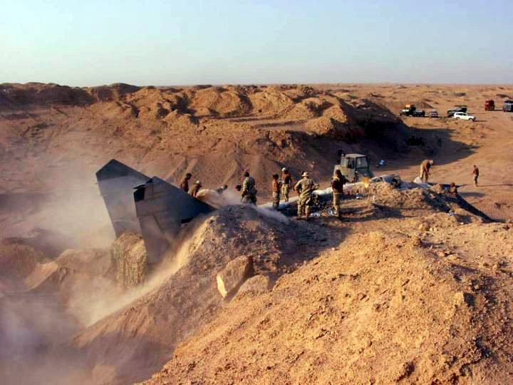 File:Mig25 buried in iraq.jpg