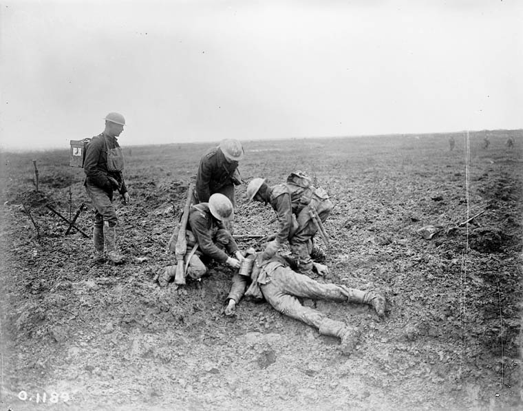 File:Tending a wounded German on the battlefield. Vimy Ridge - April 1917 - MIKAN 3194786.jpg