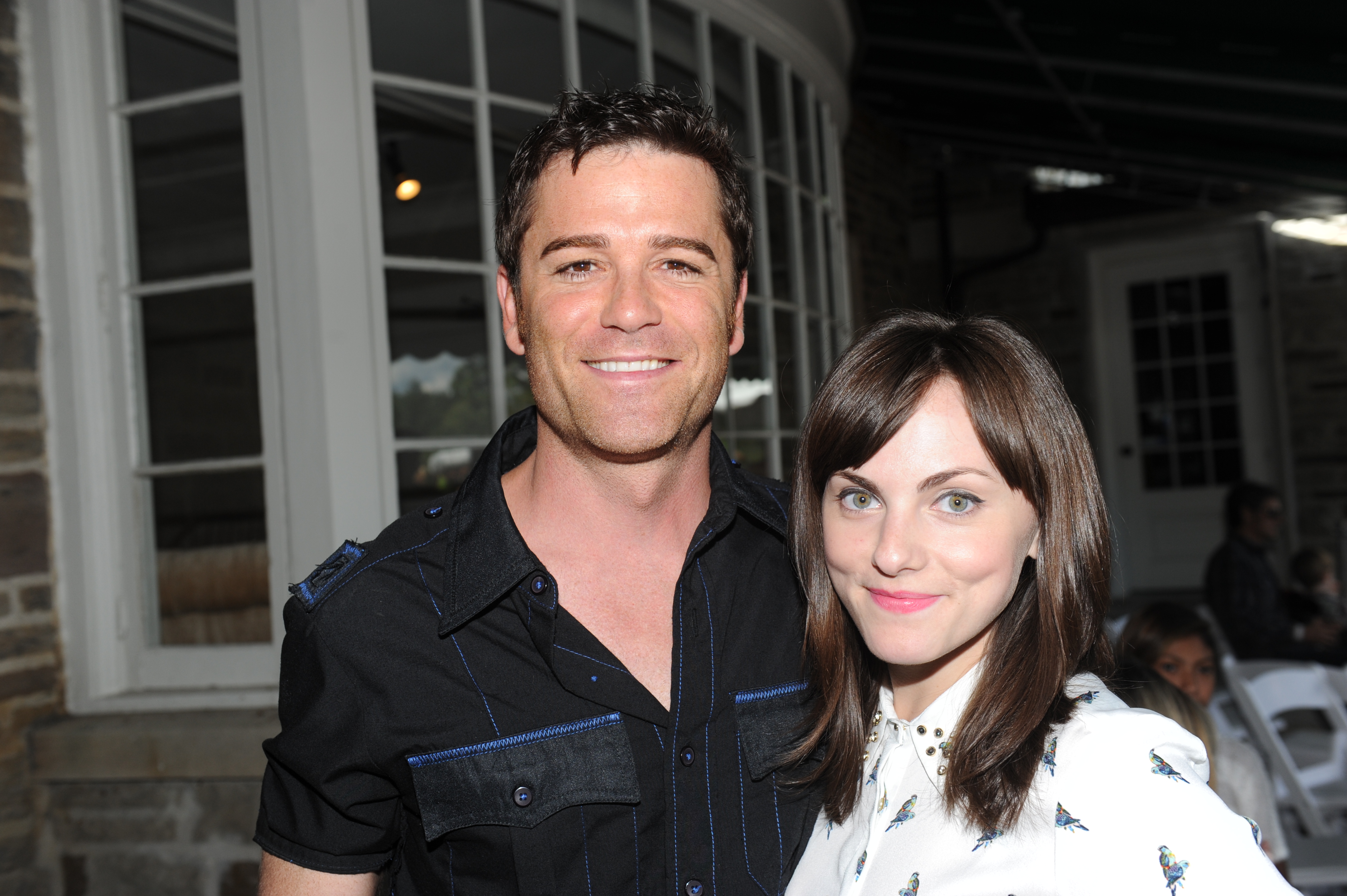 Yannick Bisson and Georgina Reilly at the CFC ANNUAL BBQ 2012.jpg. 