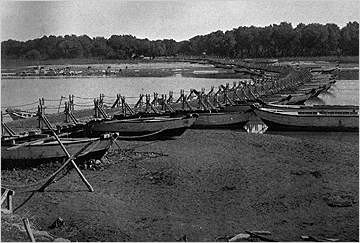 A bridge of boats over the Ravi River in British India, 1895