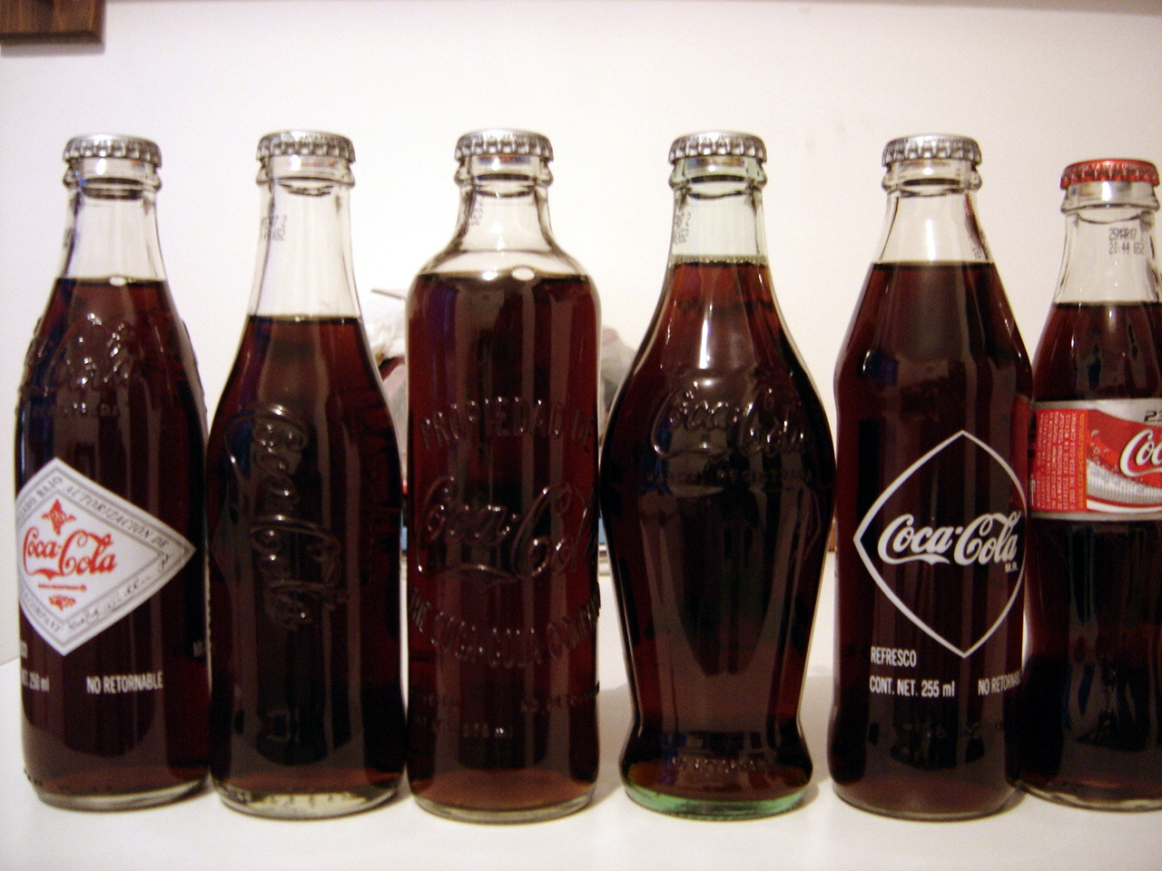 Retro sodas in long neck glass bottles.