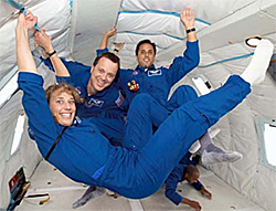 Mission Specialist Educators Lindenberger, Arnold, and Acaba during a parabolic flight.