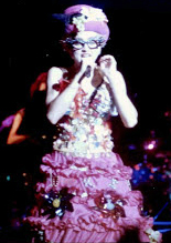 Madonna in 1987 during the Who's That Girl World Tour dressing an "exaggerated" costume Madonna II B 3a (cropped).jpg