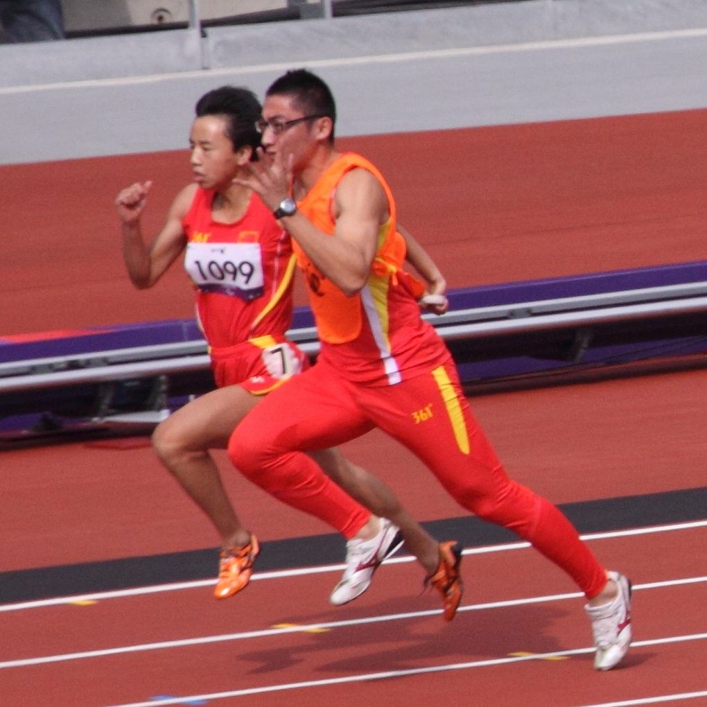 Zhou of China and her guide Jie Li in 2012