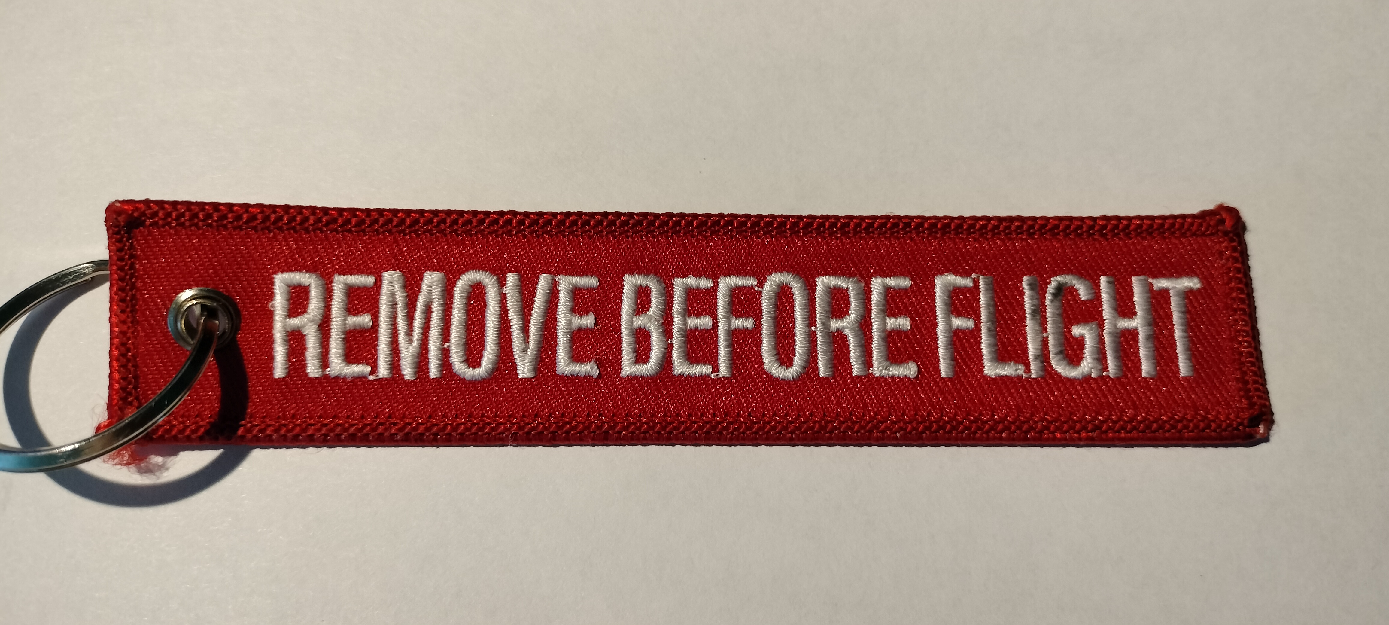 Portachiavi, Remove before flight