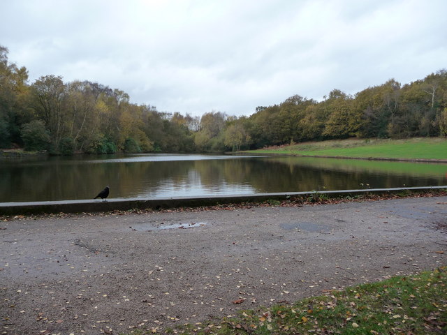 Men fishing at Keepers Pool in Sutton Park, Sutton Coldfield near