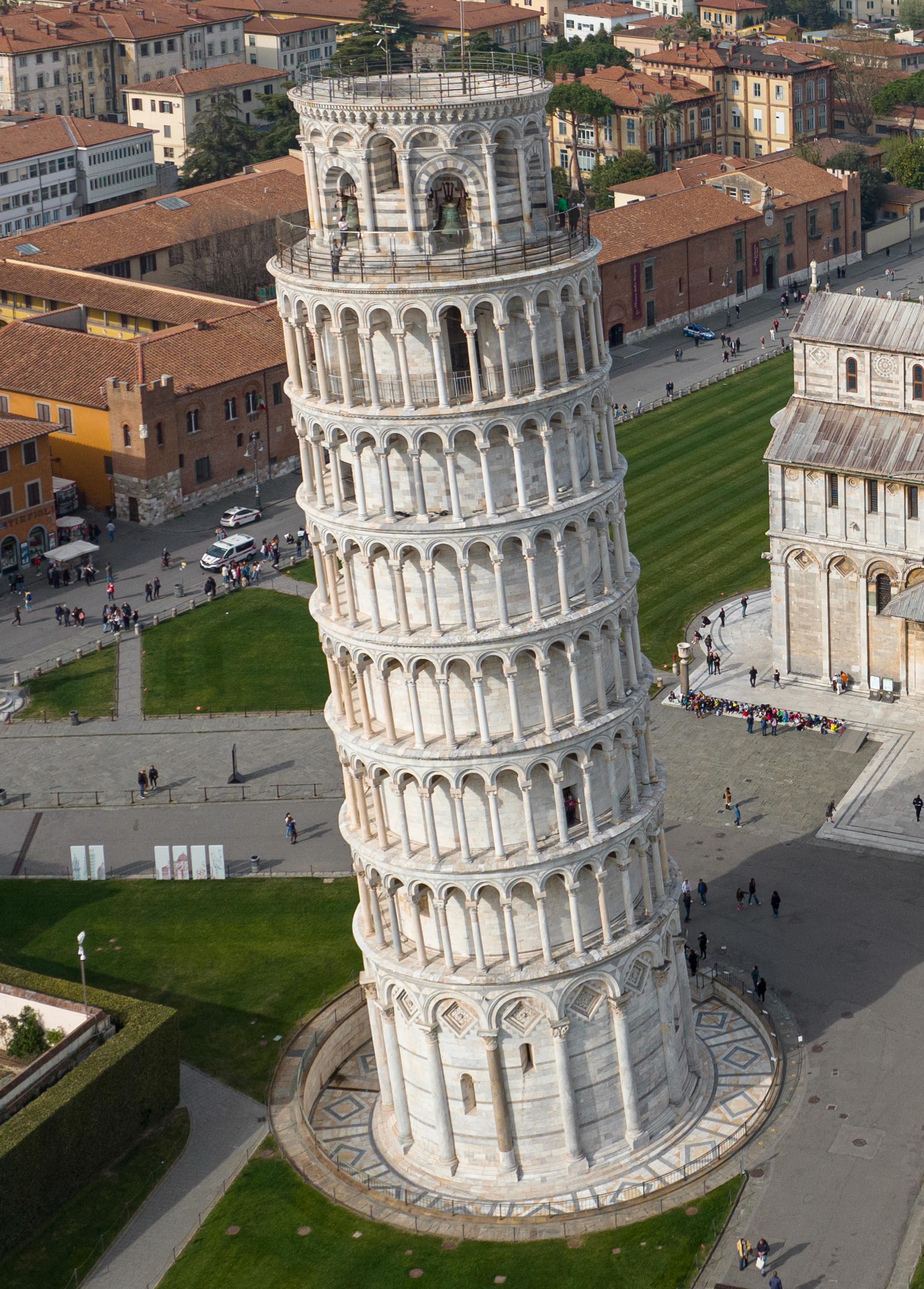 a) Side view of the Tower of Pisa with indication of the years of