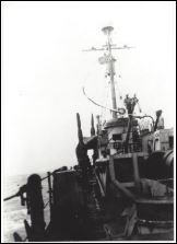 6 Jun 1945. USS PC-552 salutes the Normandy Beaches before starting back home. Note the going home pennant from the mast head to the rear of the 40MM gun tub representing 18 months overseas. Courtesy of William Kesnick. Salute D-Day.JPG