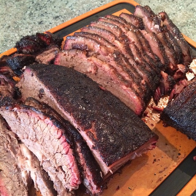 https://upload.wikimedia.org/wikipedia/commons/4/4c/Friend%27s_BBQ_tasting_party_with_the_star_of_the_show-_Franklin_BBQ_Brisket._Tastes_best_without_sauce_or_with_Rudy%27s_BBQ_sauce_IMHO._%2816500950090%29.jpg