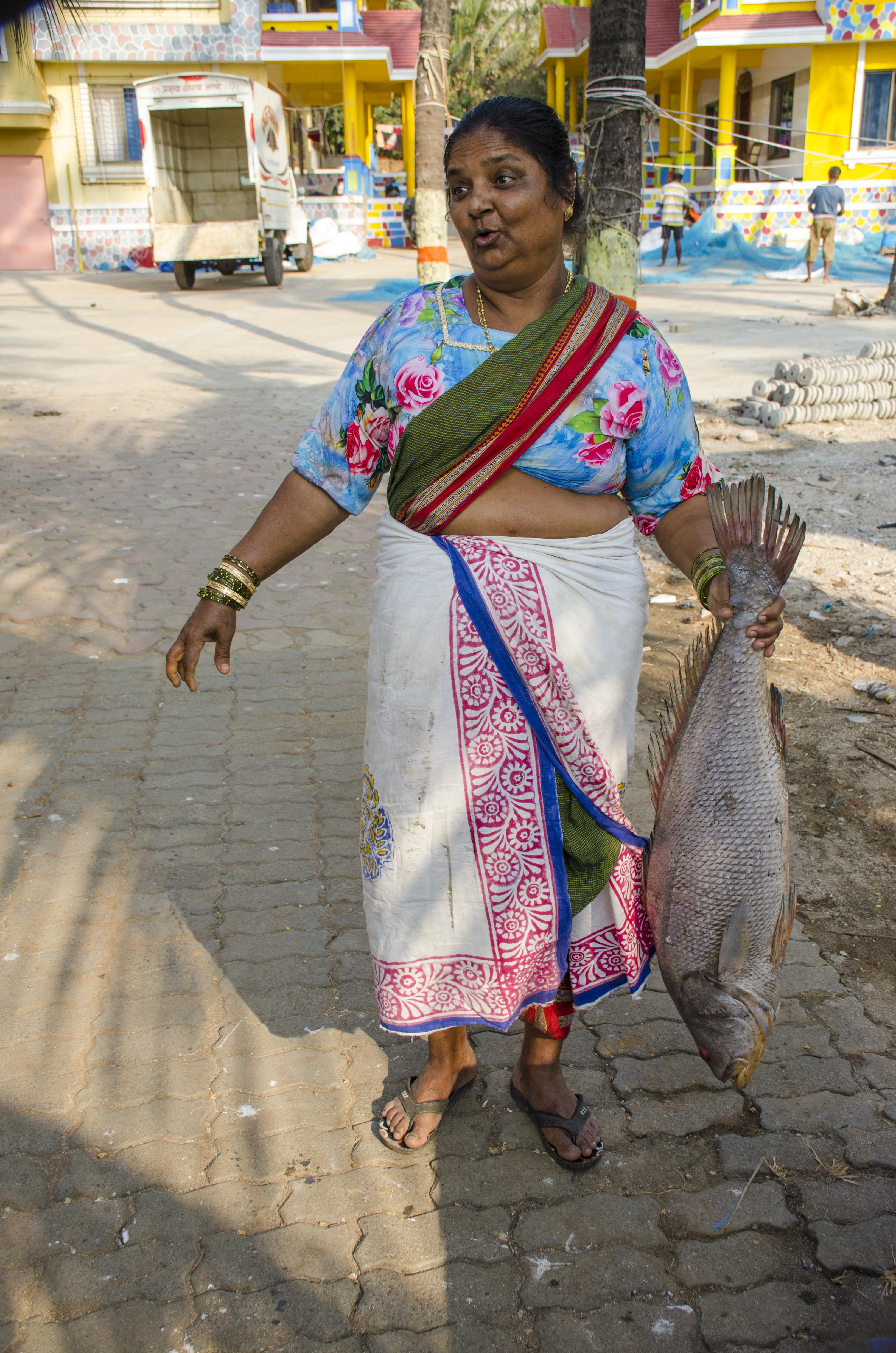 Lady poses with a big fish Velankanni Beach