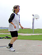 S.J. Rozan playing basketball at the 2006 Bouchercon in Madison, Wisconsin (cropped 2022).jpg