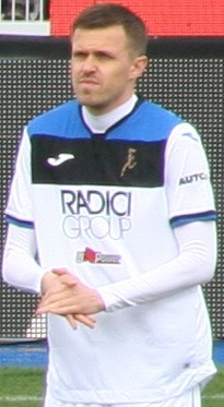Josip Iličić with Atalanta in 2020 (away kit, featuring the running girl in place of the club's crest)