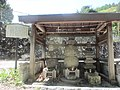 A memorial tower for Lord Suwa Teruun Yorishige (Miyagawa, Chino City, Nagano Prefecture; the top of the tower shows signs of repair.)