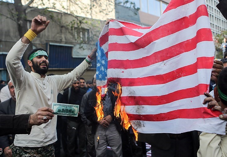 File:Iranian Protesters Burning USA Flag.jpg - Wikimedia Commons