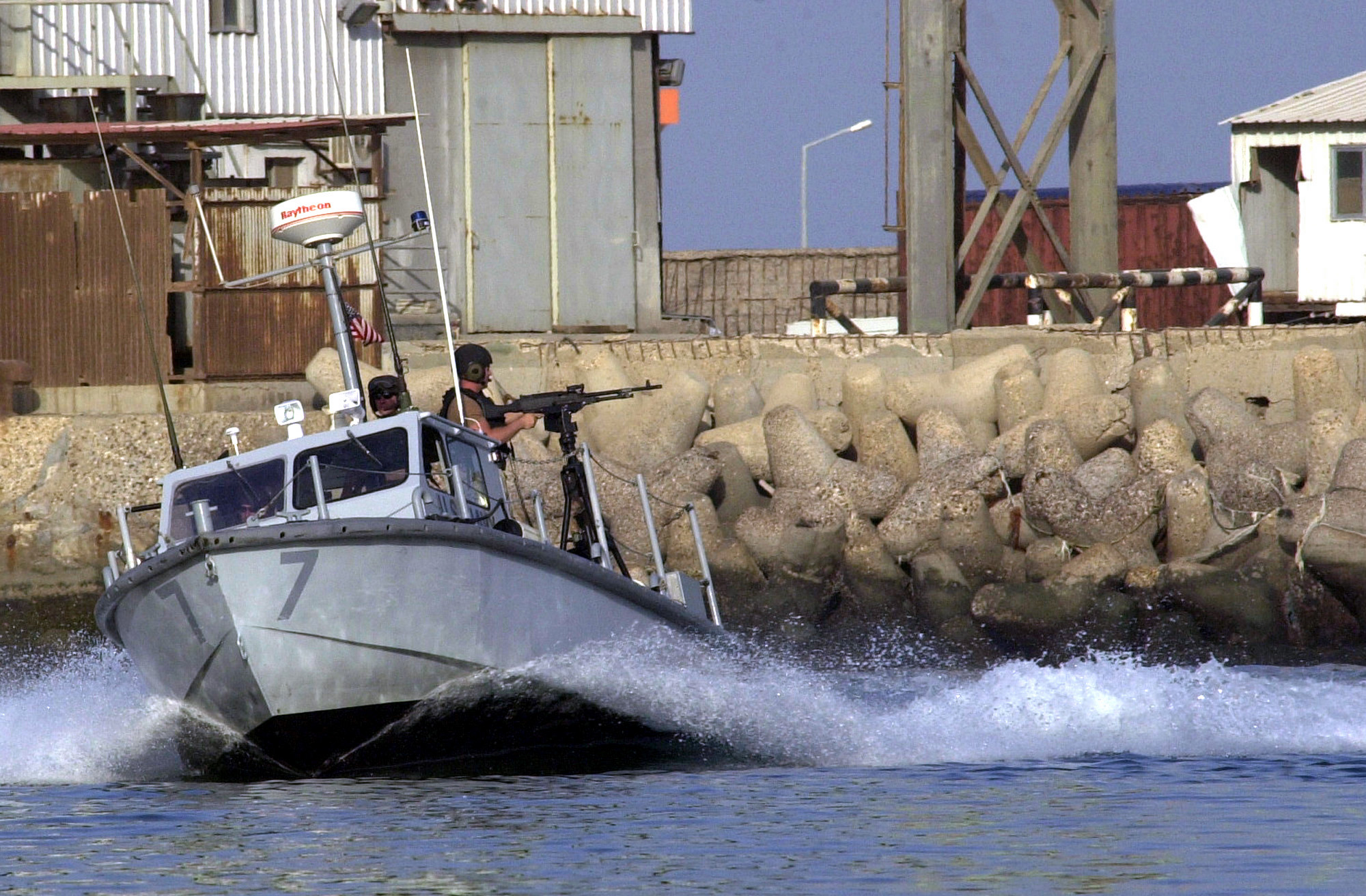 US Navy 030401-N-5362A-017 A boat crew assigned to Inshore Boat Unit Fourte...