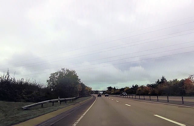 File:A30 passing under power lines - geograph.org.uk - 4744737.jpg