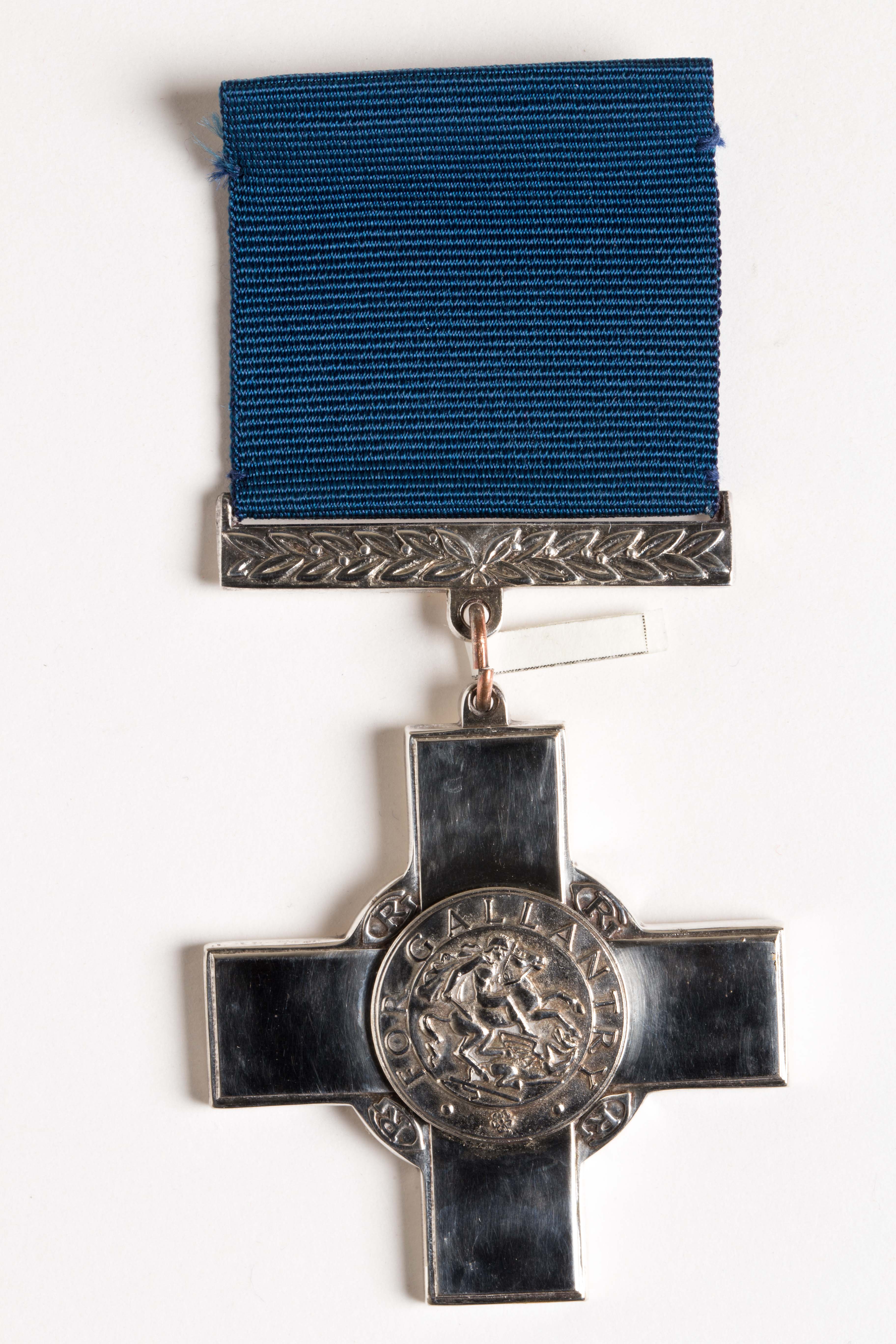 Reproduction of George Cross medal and ribbon