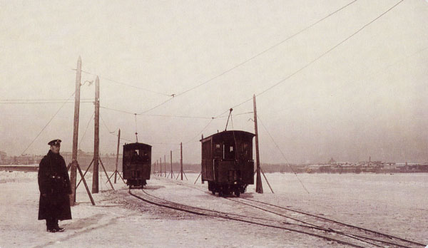 Trams ride on the ice of Newa river