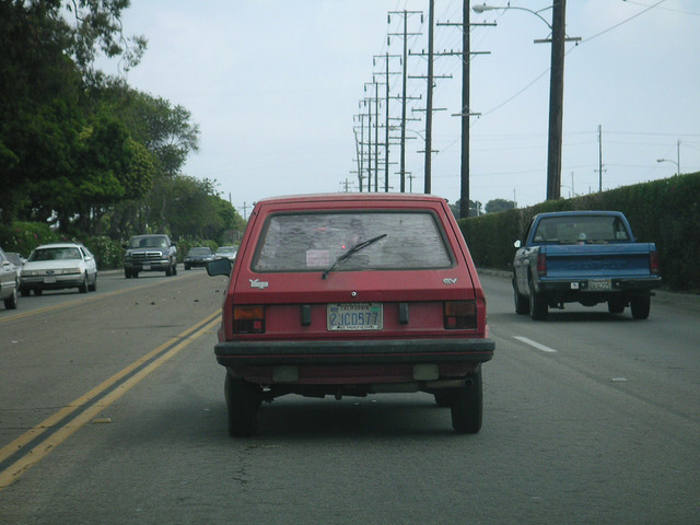 File:A red Yugo GV on a road.jpg