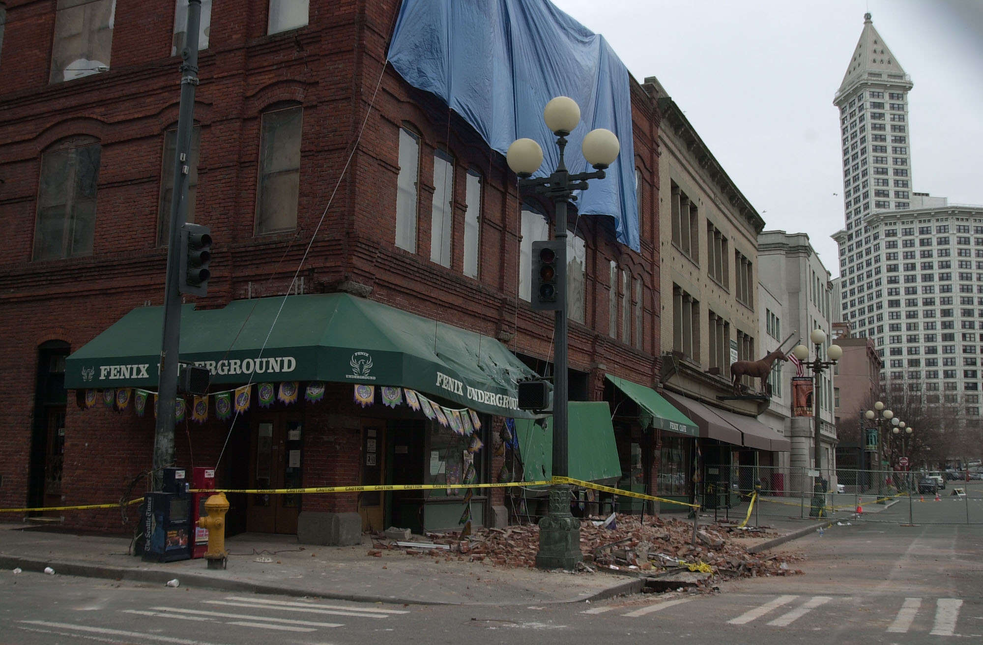 Seattle, WA, 03/05/01 -- Damage in Pioneer Square from the 02/28 earthquake. Photo by: Liz Roll/FEMA News Photo. After rehabilitation, the Cadillac Hotel building in the foreground became the new visitor center of the Klondike Gold Rush National Historical Park.