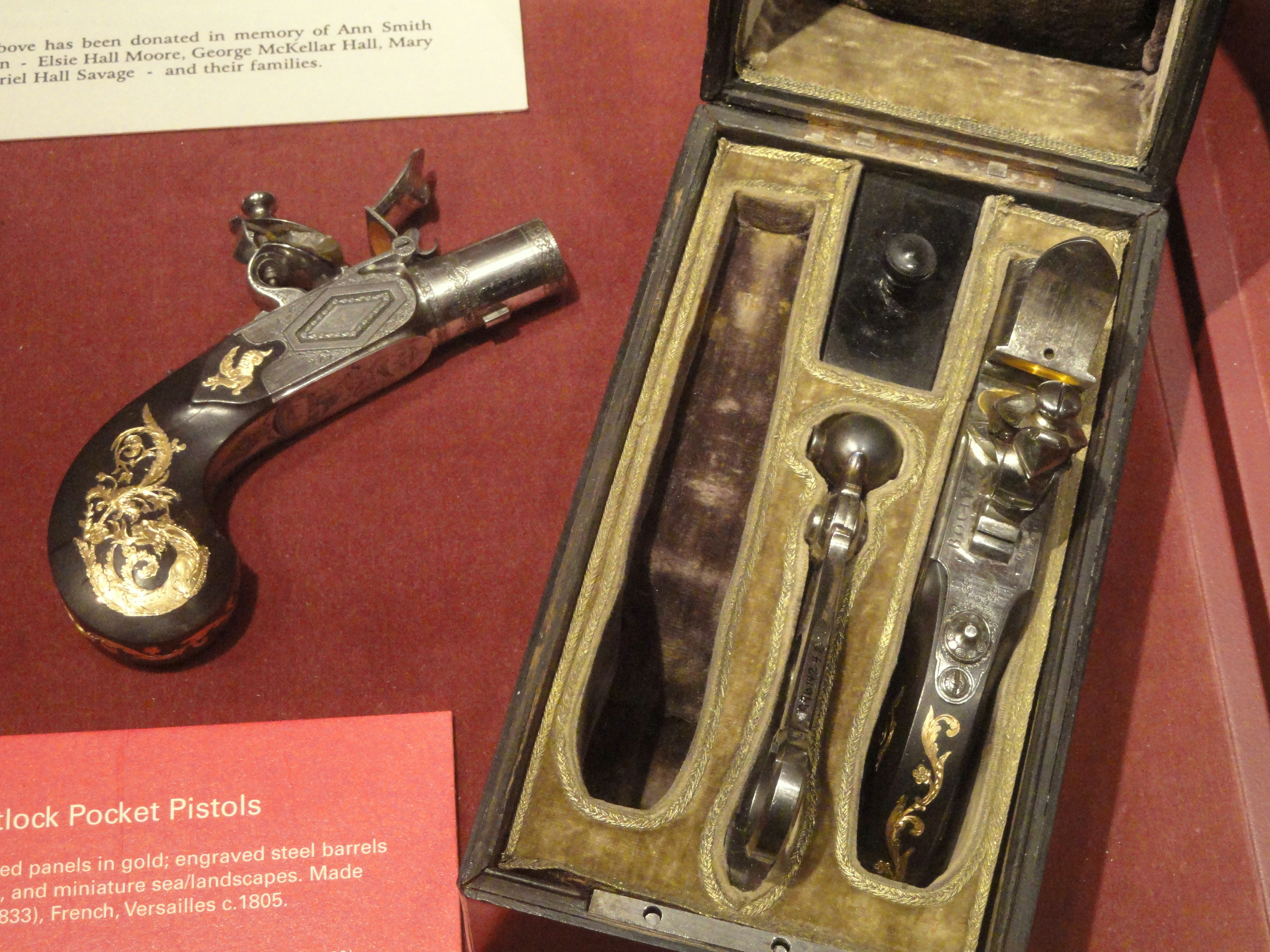 Cased pair of flintlock pistols with accessories Boutet