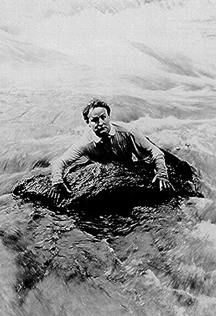 Houdini swims above Niagara Falls in a scene from The Man from Beyond (1922)