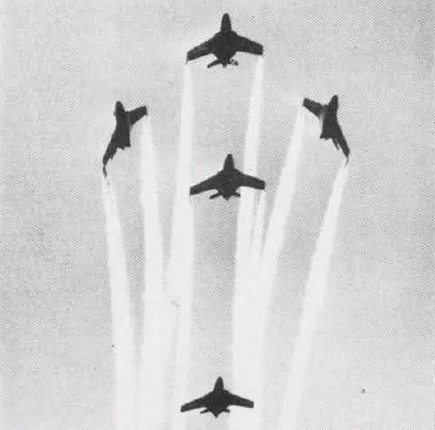 Blue Angel F9F-8's performing a "fleur-de-lis" maneuver in 1955