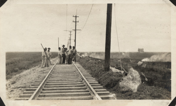 File:Crew repairing track at Texas City junction.jpg