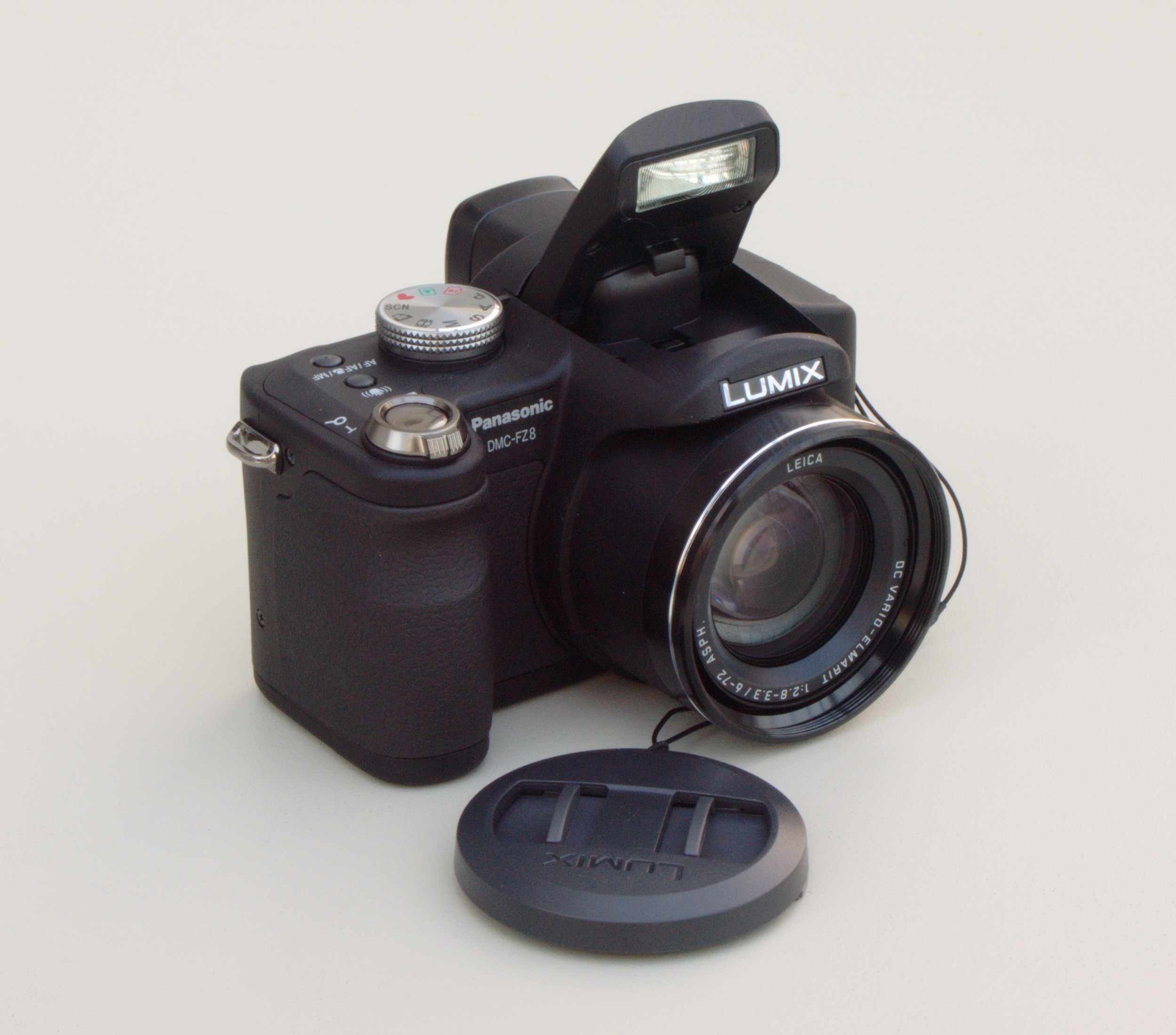 Lumix DMC-FZ8 (flash opened with lens cap).jpg - Wikimedia