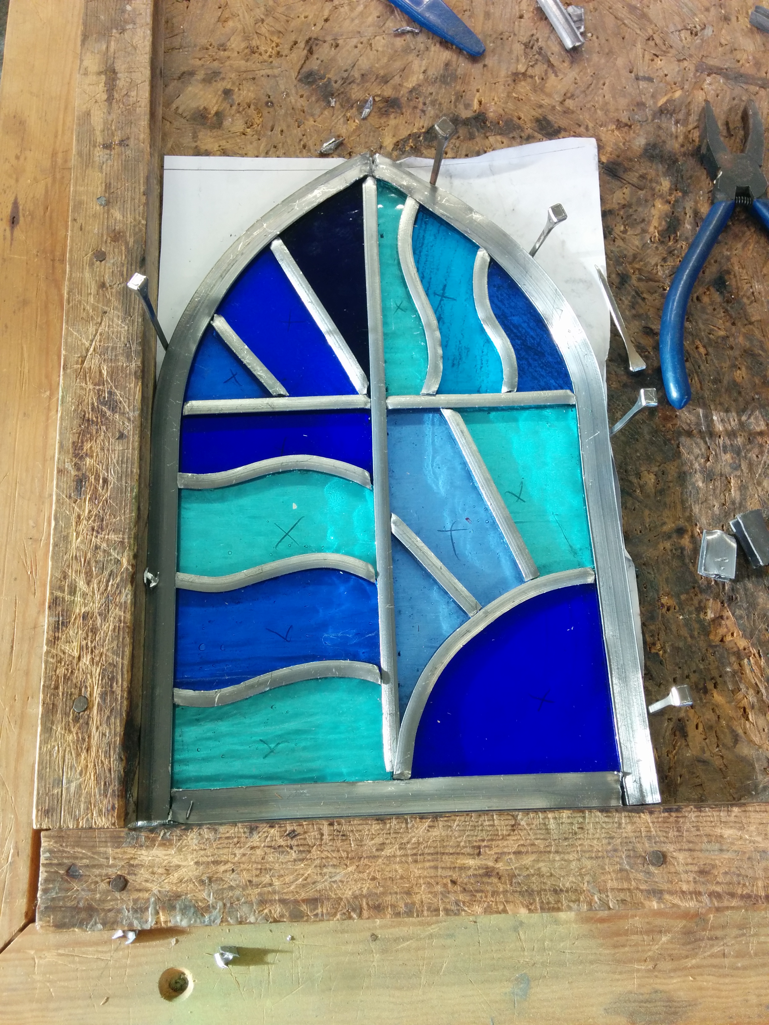 https://upload.wikimedia.org/wikipedia/commons/5/56/Stained_glass_before_solder.jpg