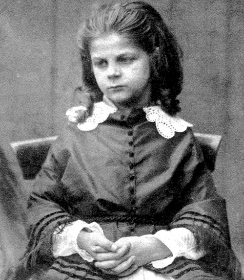 File:Agnes Grace Weld in ringlets and a lace collar.png