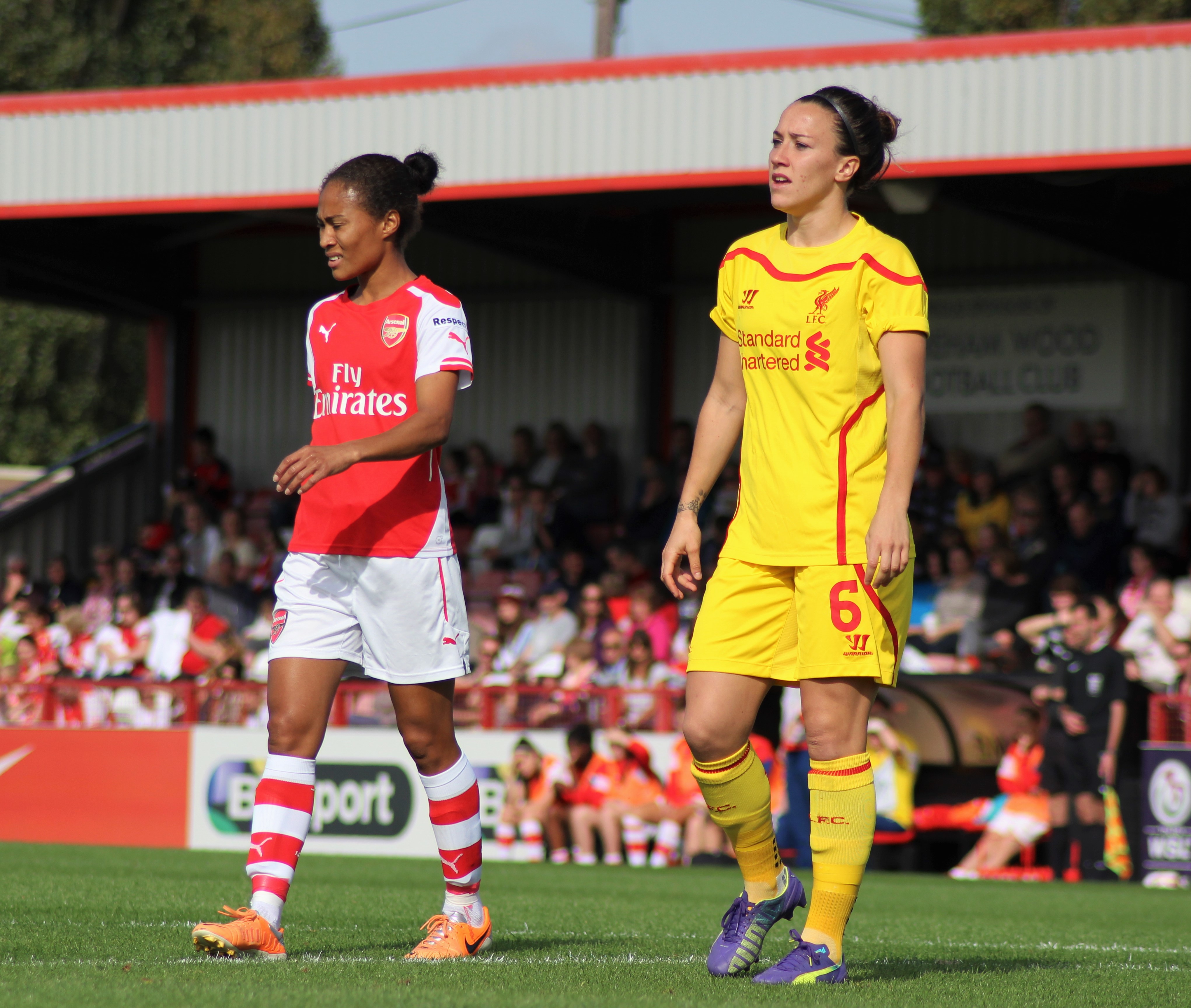 Rachel Yankey of Arsenal Ladies and Lucy Bronze of Liverpool Ladies during a WSL game