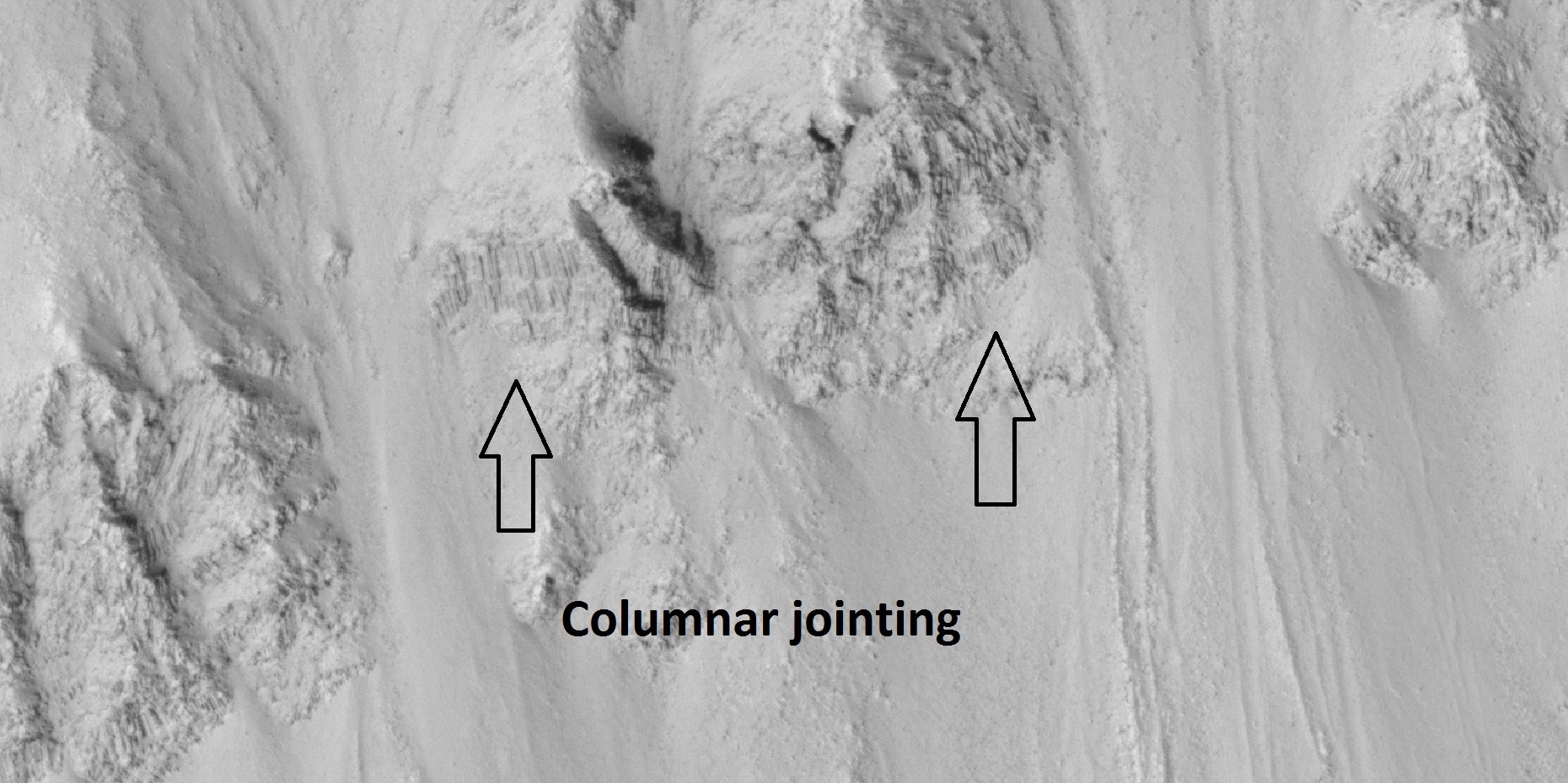 Close view of crater wall with columnar jointing labeled