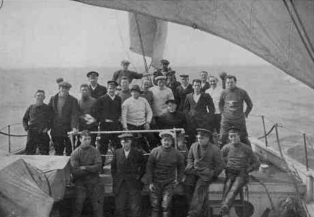 Members of the Imperial Trans-Antarctic Expedition aboard Endurance, 1914. Crean is second from the left in the first standing row. Shackleton (wearing soft hat) is in the centre of the picture.