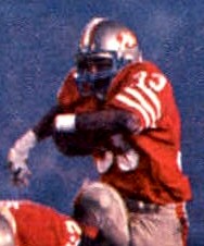 Craig rushing the ball for the 49ers during Super Bowl XIX. 1986 Jeno's Pizza - 28 - Roger Craig (Roger Craig crop).jpg