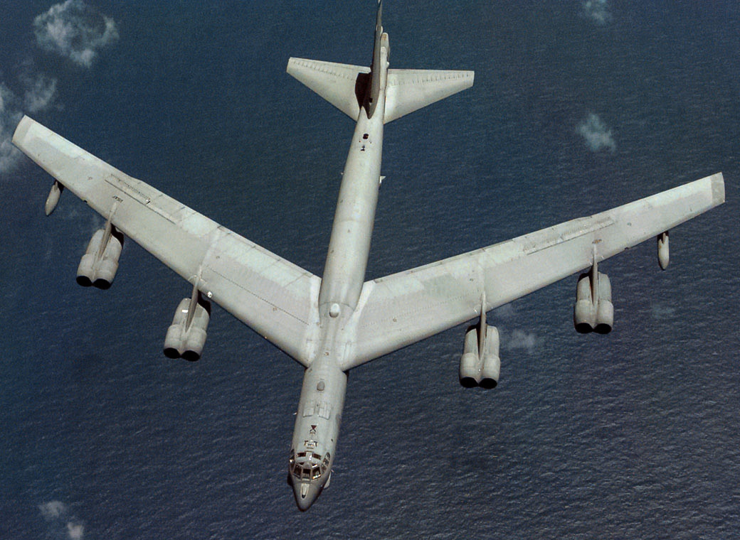 Aerial top/side view of gray B-52H