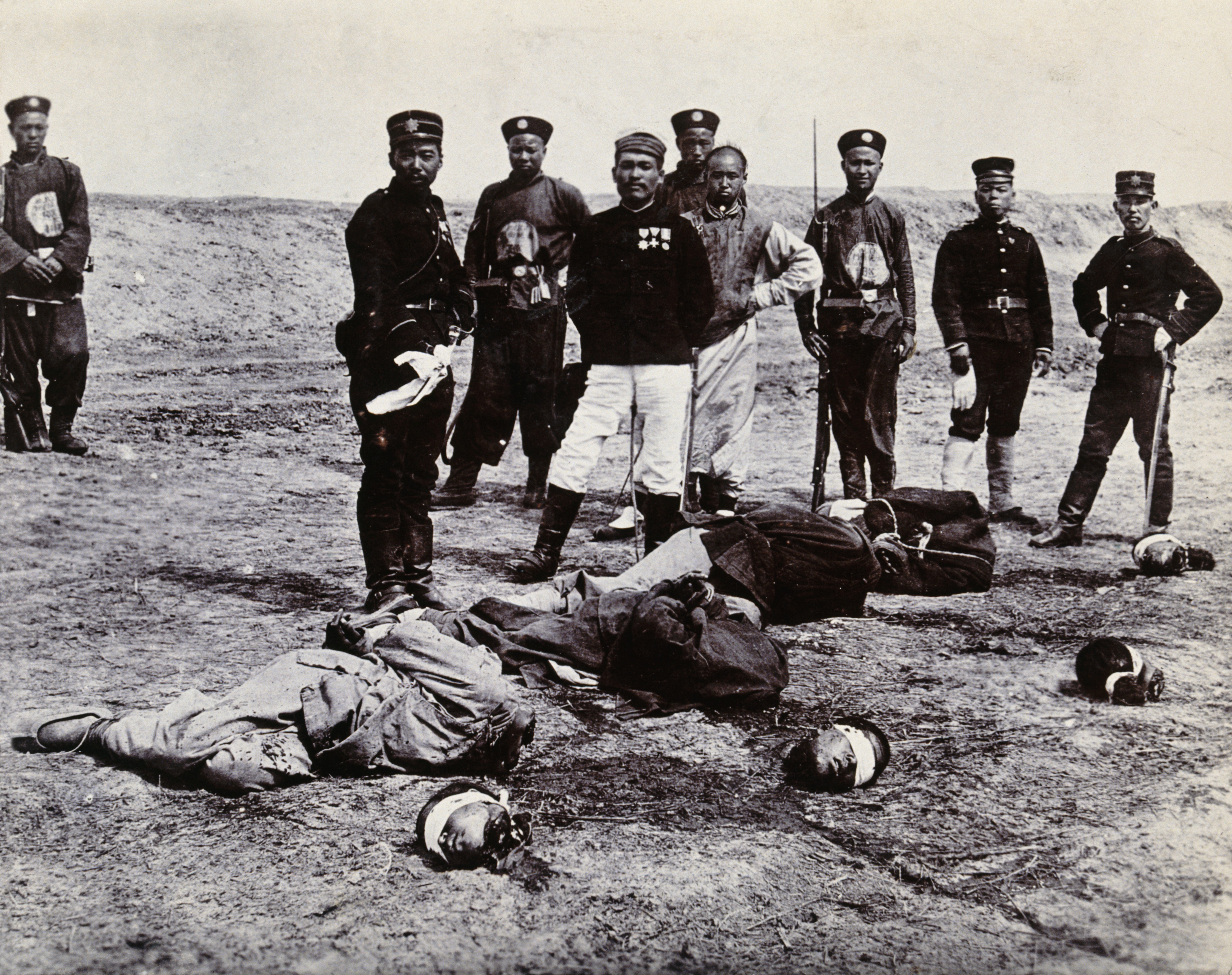 Boxers beheaded in front of a group of Chinese and Japanese officials.