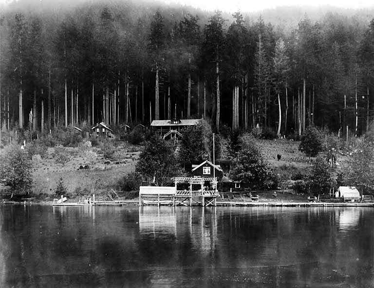 File:Qui Si Sana Sanatorium and Biological Institution, dock and cabins as seen from Lake Crescent, 1913 (WASTATE 1566).jpeg