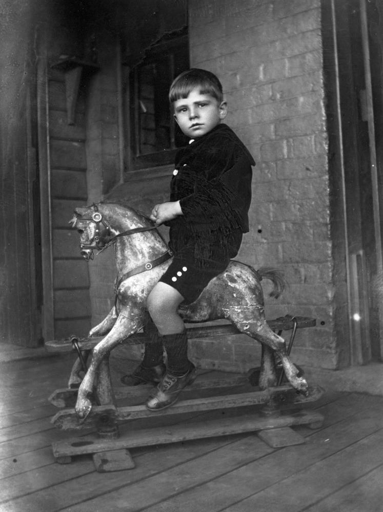 boy on rocking horse