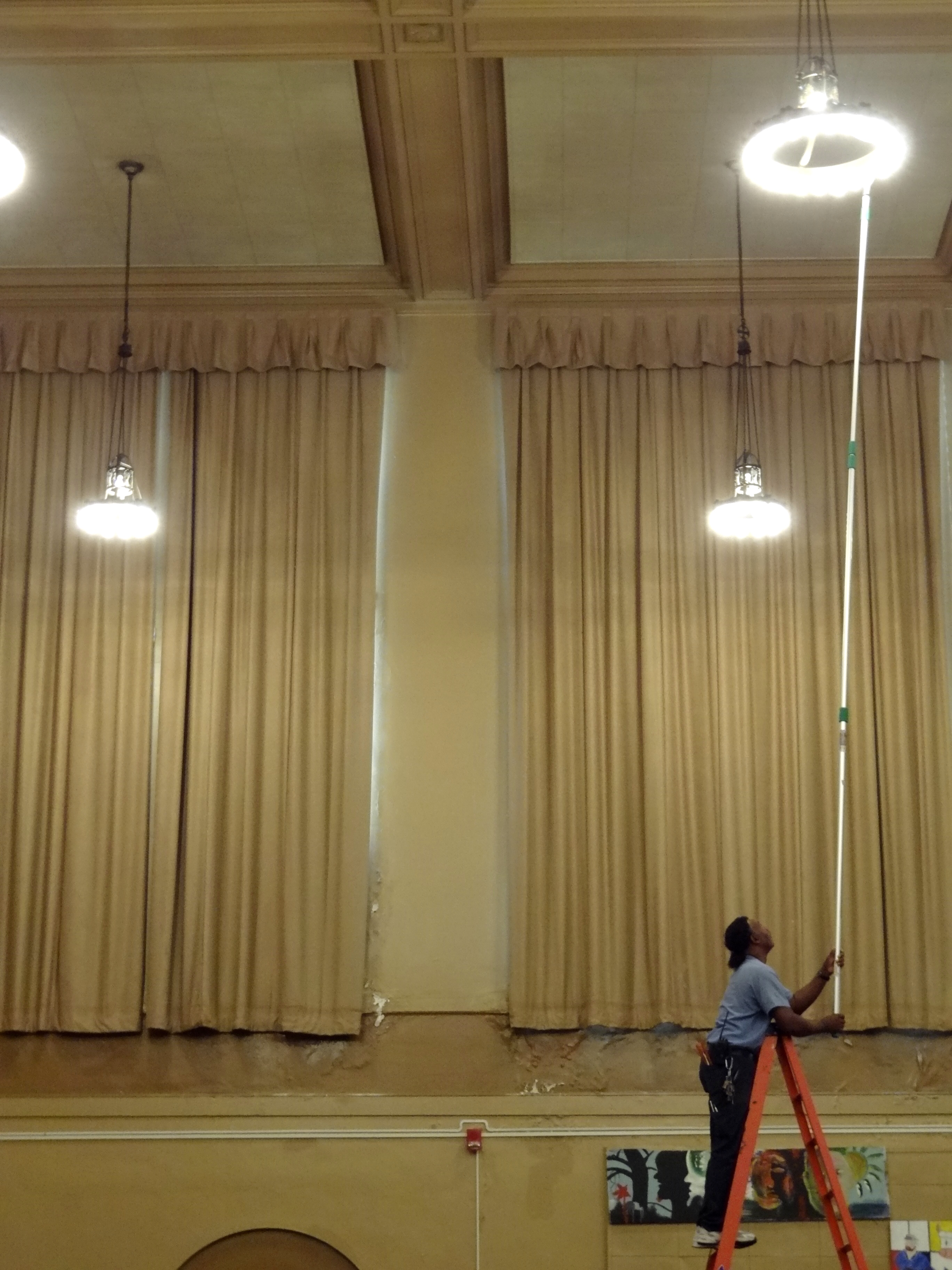 File Changing A Light Bulb In The Gymnasium Central High School